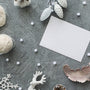 a table topped with lots of different types of christmas decorations