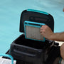 Someone is cleaning the filter of a pool cleaner.