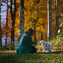 woman holding dogs
