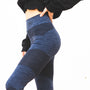 person in black long sleeve shirt and blue denim jeans
