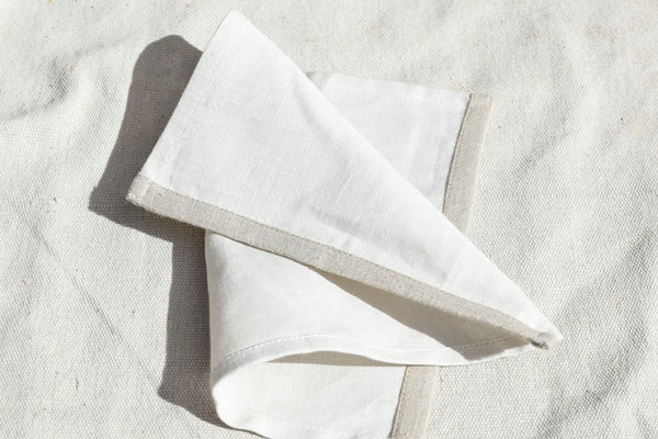 a paper chair on a carpet