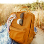 a brown bag on a person's leg