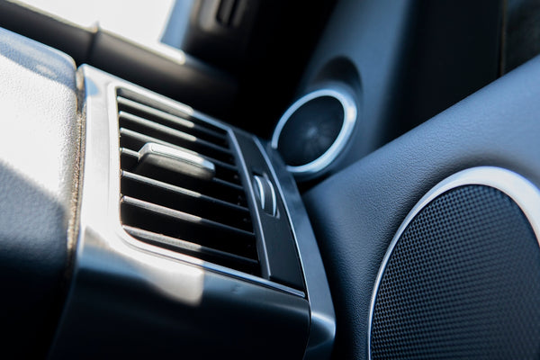a close up of a car radio with speakers